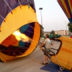 A pilot inflates the balloon in preparation for flight.